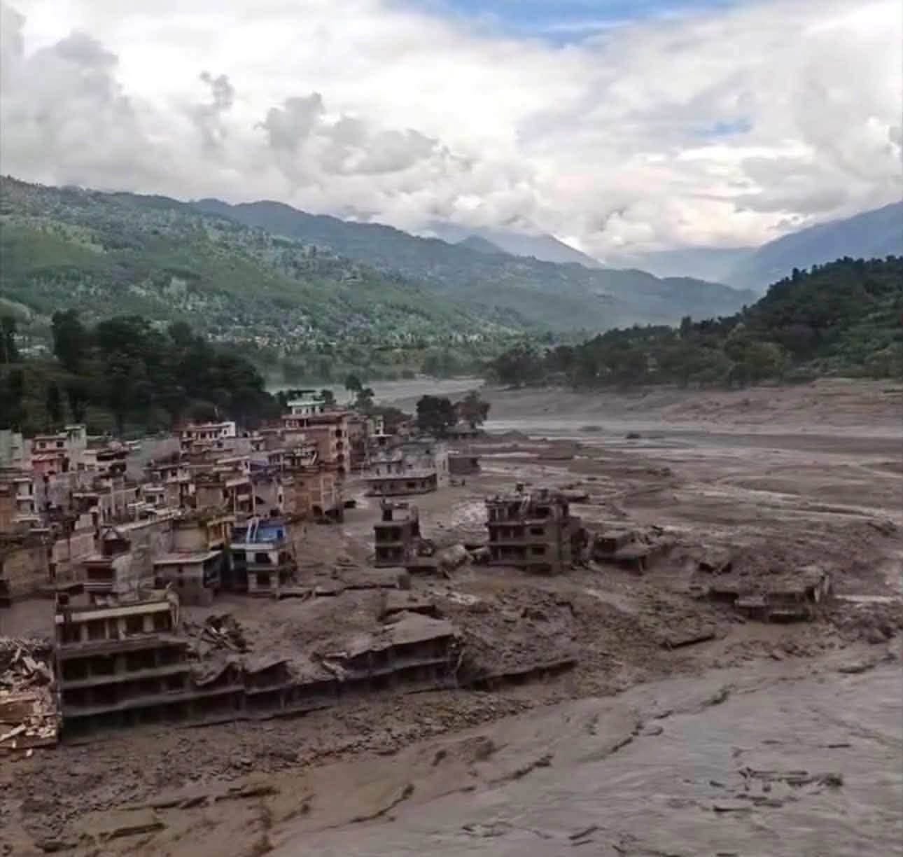 A riverside town left buried in silt and rubble after the flood receded